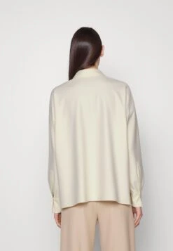 DRYKORN Cloelia - Blouse -Off White 8 DRYKORN Cloelia - Blouse -Off White -Korting Dameskleding 23ee9472617d49628c5444c8c3eeef90